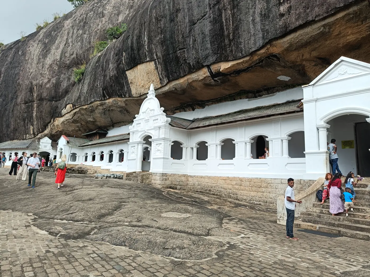 The white temple buildings beneath the rock at Dambulla