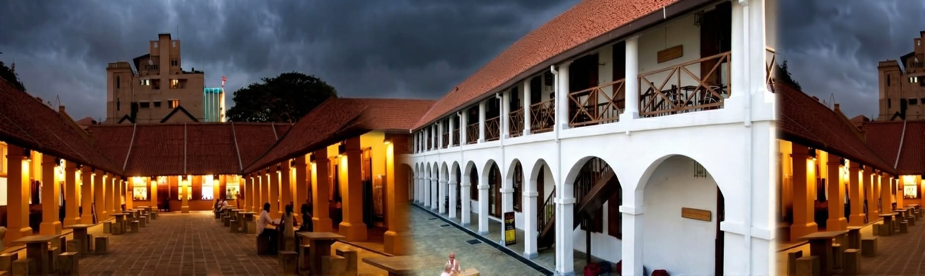 The illuminated courtyard and colonial architecture of Colombo Dutch Hospital
